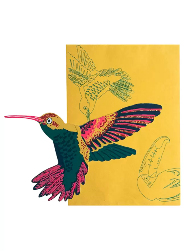 White cut-out shot: hummingbird card with matching envelope with an hummingbird and toucan motif