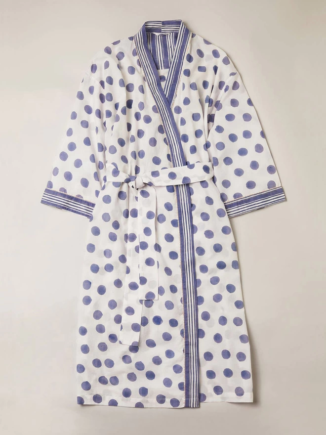Soft white block printed robe with navy spot. pattern and navy stripe border