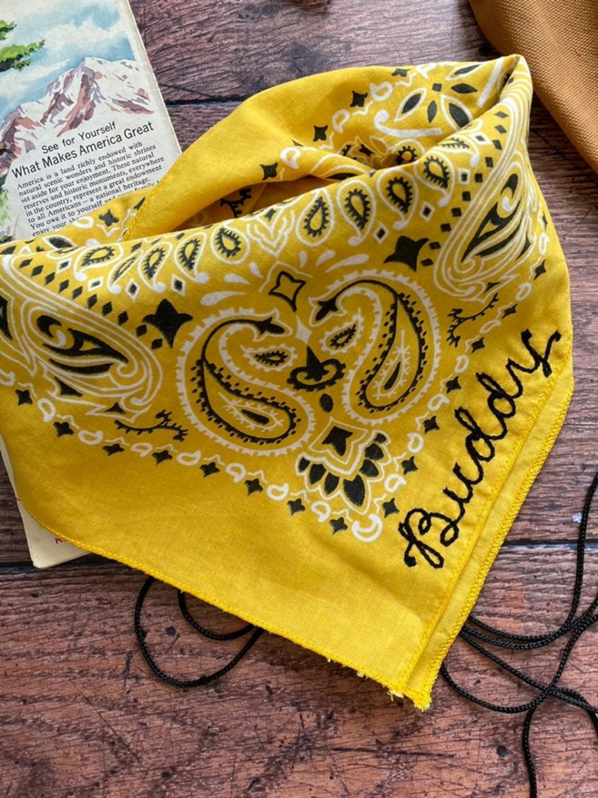 A custom chai stitch bandana in yellow