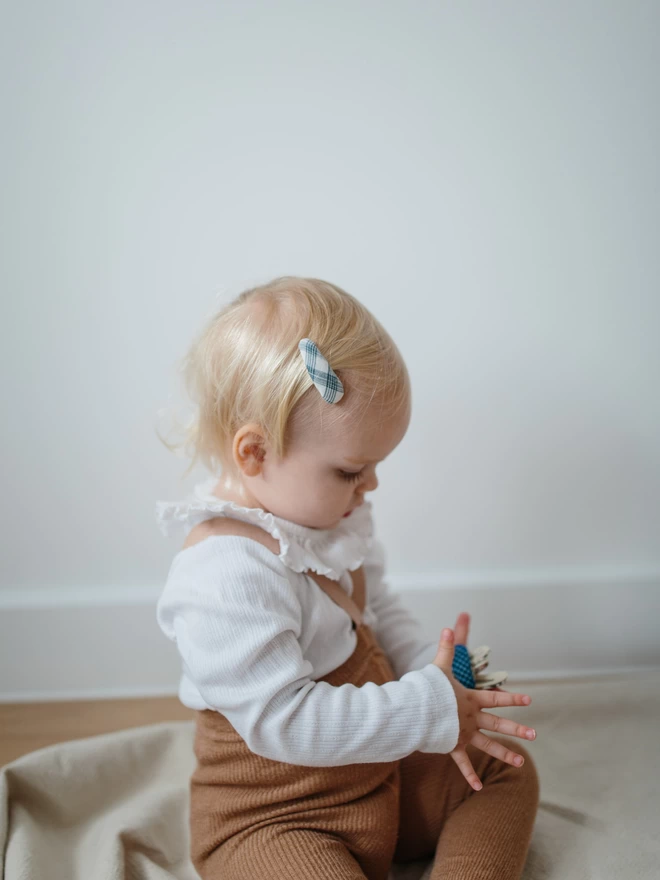 toddler with soft hair clip