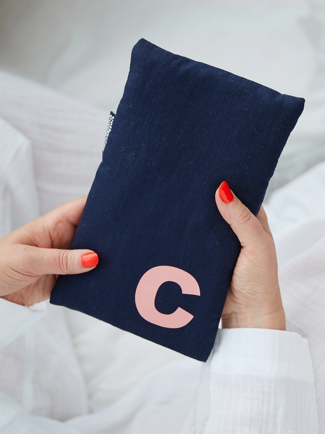 Navy linen cute hot water bottle with salmon pink letter