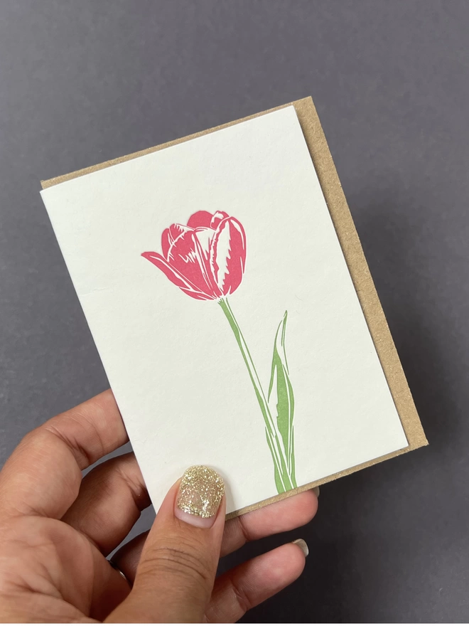 Colourful pink tulip on little note card