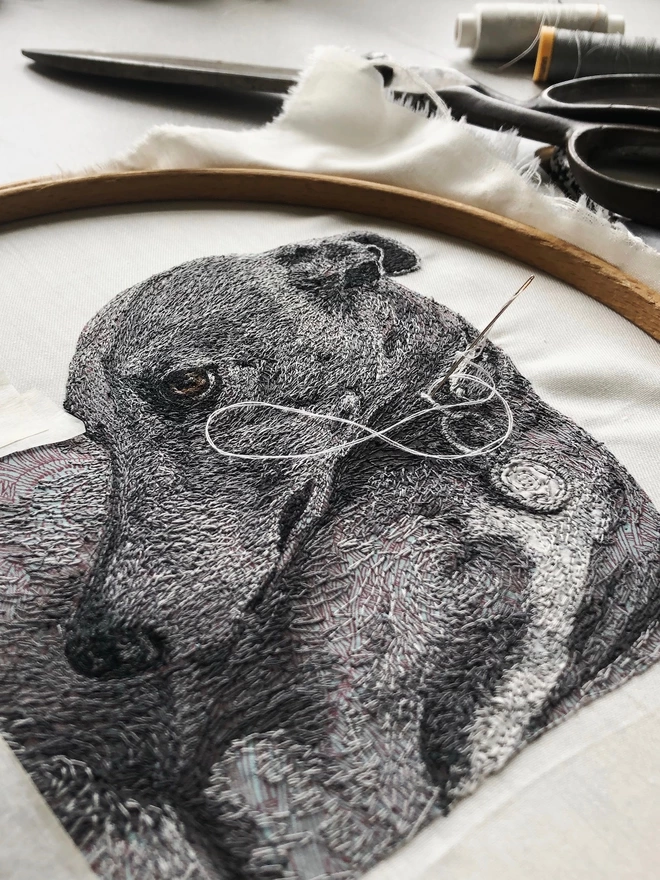 photo shows the making of an embroidered pet portrait of a blue greyhound