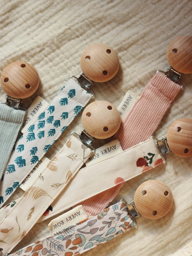 A very hand pacifier holders collection