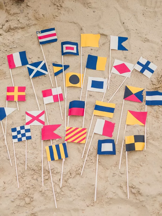 Flags seen together on sand