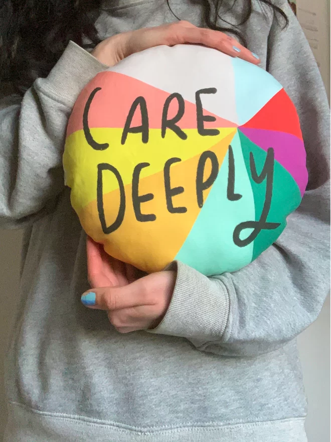 Care Deeply written on a beautiful coloured organic cotton linen plushie.