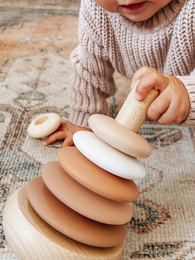Silicone ring baby stacking toy in neutral colour sandstone shade