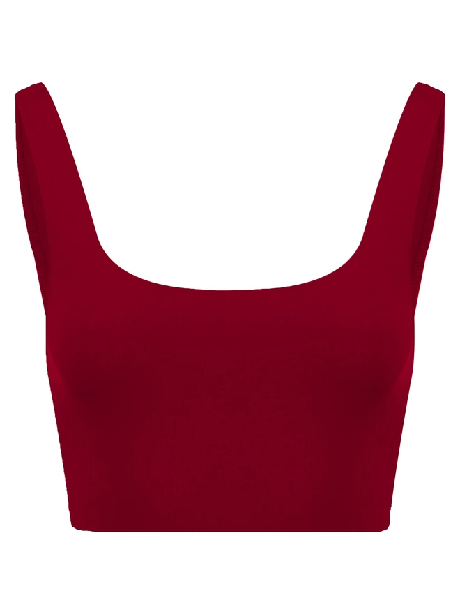A front view flat lay image of a red Davy J Sustainable Waterwear cropped swim top with a square neckline and shoulder straps