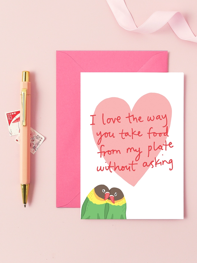 a funny valentines card featuring two love birds. I love the way you take food from my plate without asking!