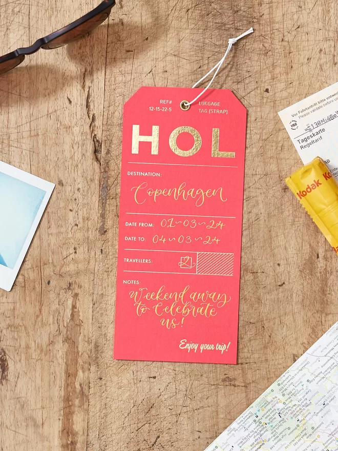 hot-pink-luggage-tag-with-calligraphy-for-surprise-holiday-reveal