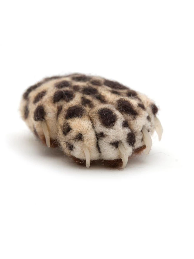 Needle-felted leopard paw brooch with polymer clay claws 