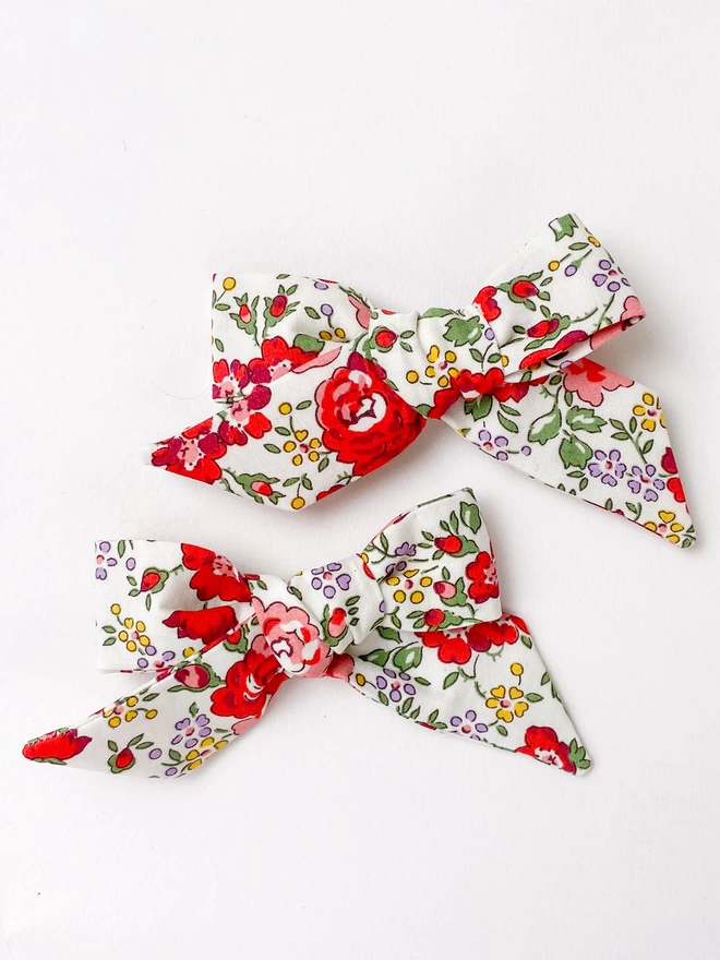 Close up of red Floral hair bows 