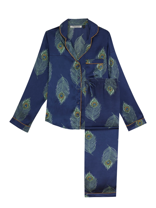 Flat shot of traditional satin navy blue peacock print pyjamas