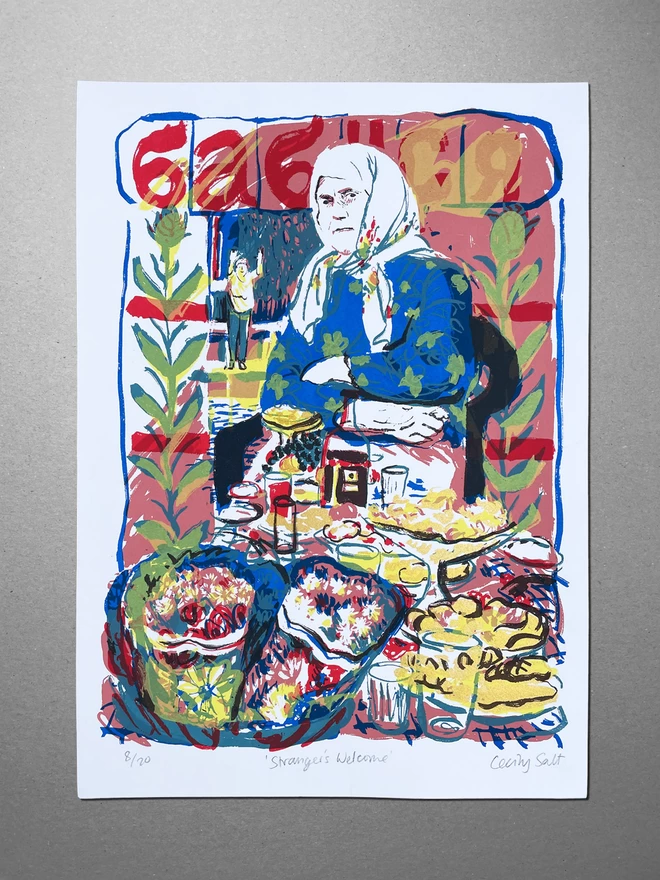 Full view of an A2 screenprint, laid on a background of greyboard. The print depicts a headscarf wearing grandmother sat with a table of foods, flowers and folk symbolic patterns framed around her, to make her the stoic hero of the piece. A small lady waves in the background.
