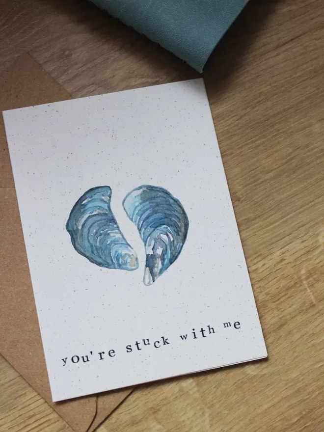 'You're Stuck With Me' Card on wooden table