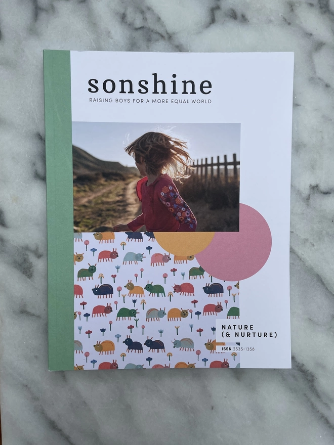 Sonshine Magazine Issue 16: Nature & Nurture a paper magazine featuring a photograph of a child on a sandy path at sunset