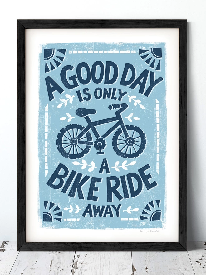 blue bike ride quote print in black frame
