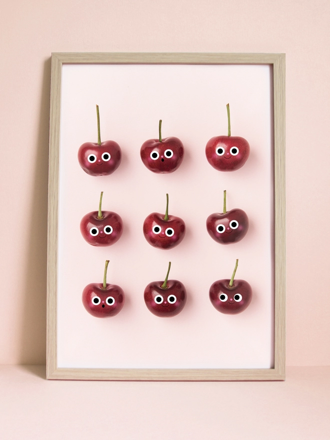 A3 art print of 9 cheerful cherry on a pink background 