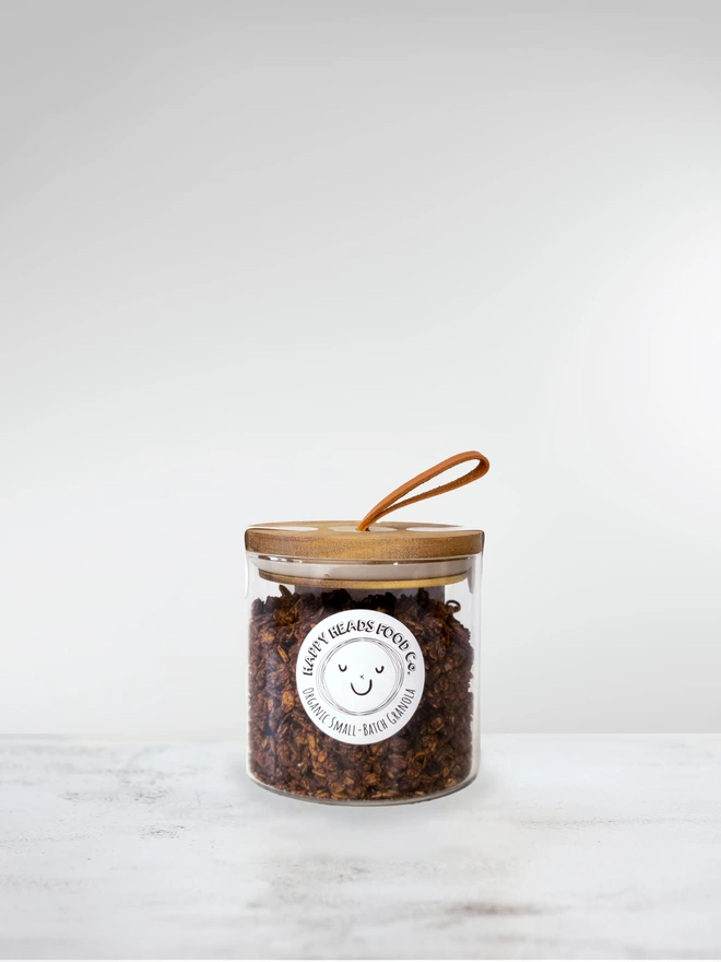Happy Heads 'Swedish Chokladbollar' granola in a small (250 g) glass jar 